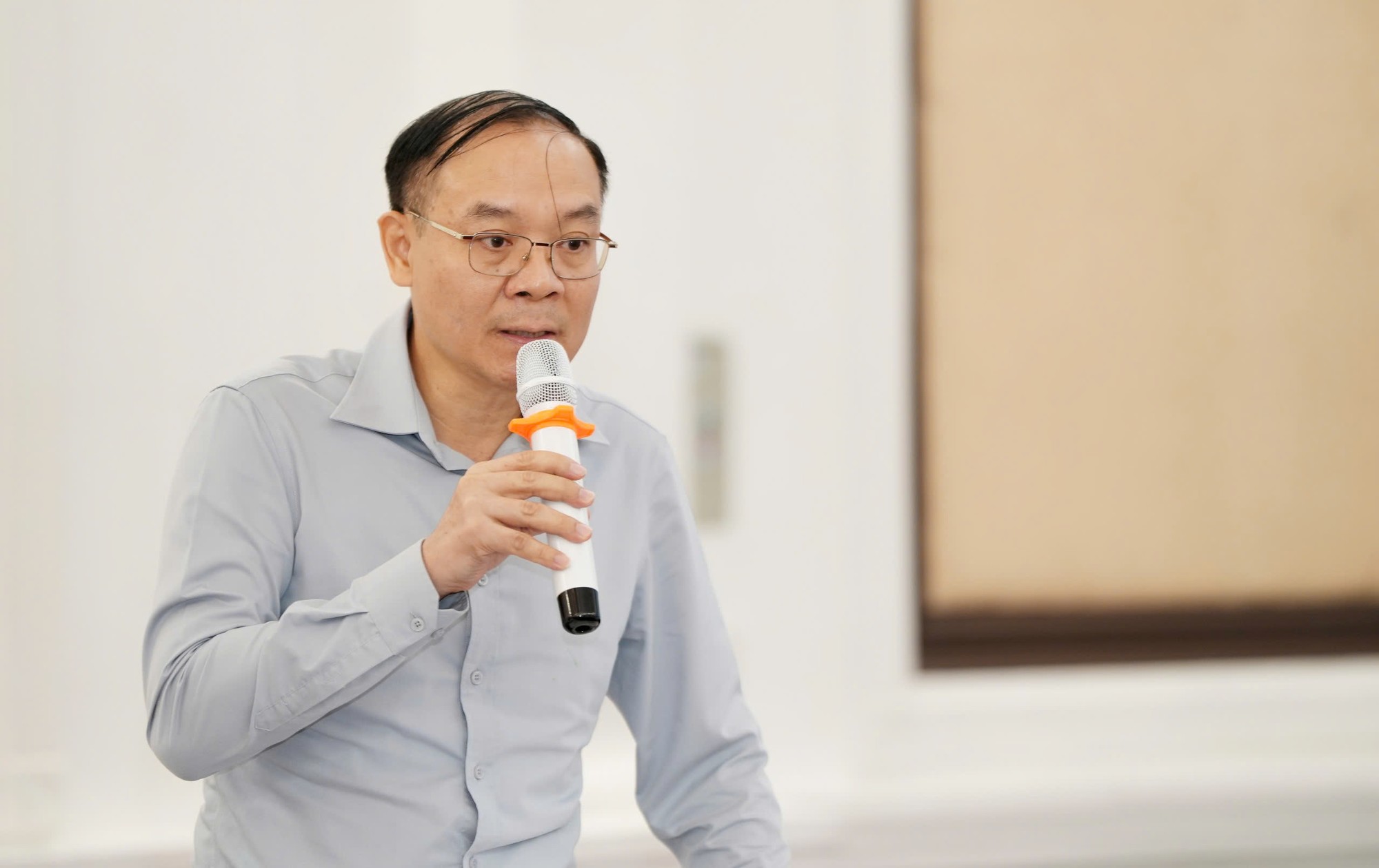 Ông Võ Anh Tuấn, Phó Cục trưởng Cục Quản lý đất đai, Bộ Nông nghiệp và Môi trường, phát biểu tại hội thảo. ongTuan3.jpg