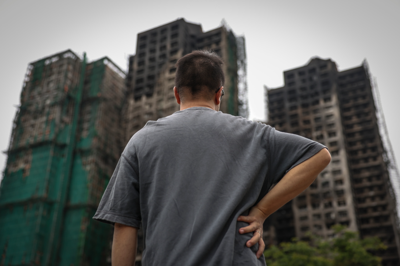 Câu chuyện nghẹn lòng đằng sau bức ảnh biểu tượng cho thảm kịch ở Hong Kong 11.png