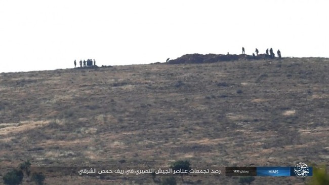 Chiến sự Syria: Quân Assad ồ ạt tiến đánh cứ địa IS và sân bay Homs - ảnh 1
