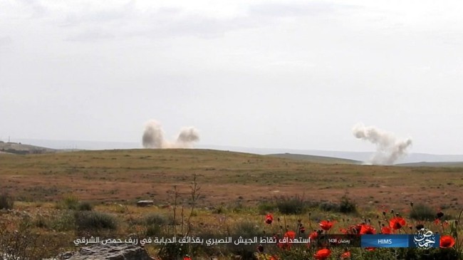 Chiến sự Syria: Quân Assad ồ ạt tiến đánh cứ địa IS và sân bay Homs - ảnh 4