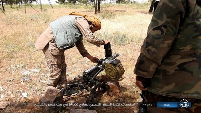 Chiến sự Syria: Quân Assad ồ ạt tiến đánh cứ địa IS và sân bay Homs - ảnh 5