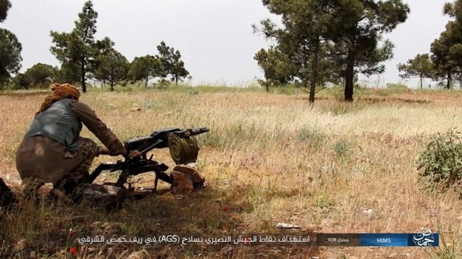 Chiến sự Syria: Quân Assad ồ ạt tiến đánh cứ địa IS và sân bay Homs - ảnh 6