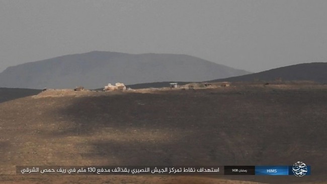 Chiến sự Syria: Quân Assad ồ ạt tiến đánh cứ địa IS và sân bay Homs - ảnh 10