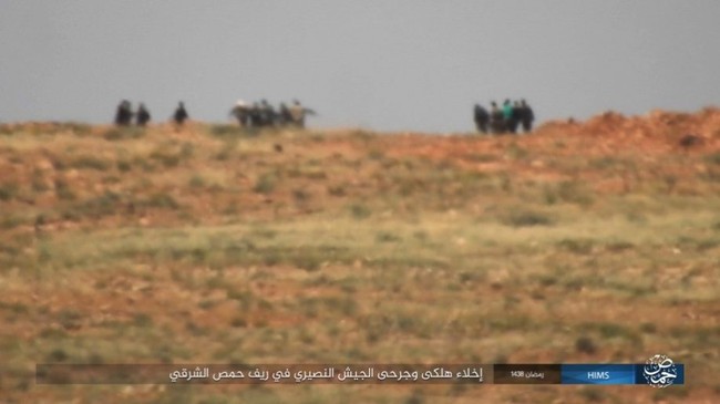 Chiến sự Syria: Quân Assad ồ ạt tiến đánh cứ địa IS và sân bay Homs - ảnh 14