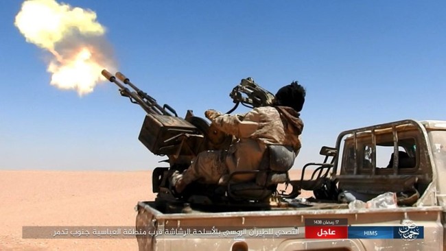 Chiến sự Syria: Quân Assad ồ ạt tiến đánh cứ địa IS và sân bay Homs - ảnh 16