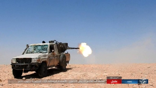 Chiến sự Syria: Quân Assad ồ ạt tiến đánh cứ địa IS và sân bay Homs - ảnh 17