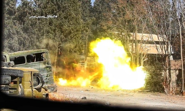 Quân đội Syria phản kích tái chiếm căn cứ ven Damascus - ảnh 10
