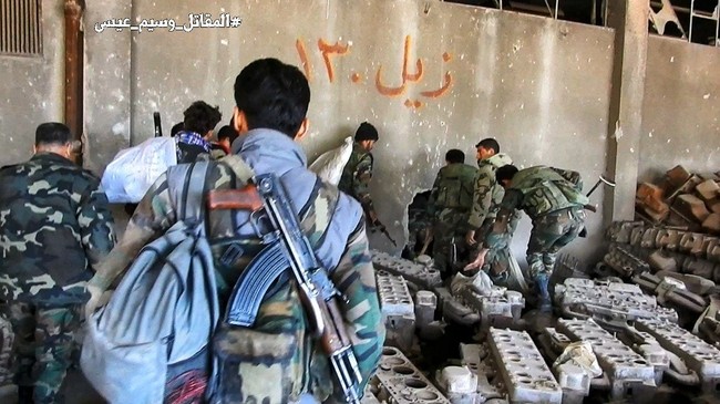 Quân đội Syria phản kích tái chiếm căn cứ ven Damascus - ảnh 11