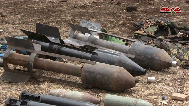 Quân đội Syria chiếm giữ lượng vũ khí khổng lồ của phe thánh chiến ở Homs - ảnh 4