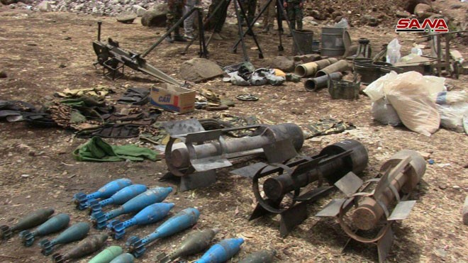 Quân đội Syria chiếm giữ lượng vũ khí khổng lồ của phe thánh chiến ở Homs - ảnh 5