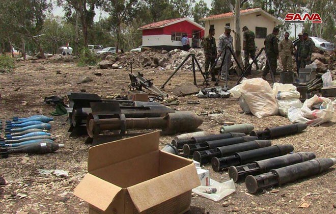 Quân đội Syria chiếm giữ lượng vũ khí khổng lồ của phe thánh chiến ở Homs - ảnh 9