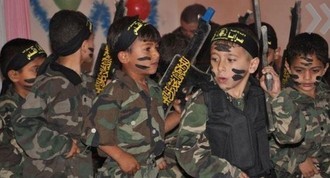 Nhà nước Hồi giáo huấn luyện các “sát thủ nhí” giết người không ghê tay ảnh 20