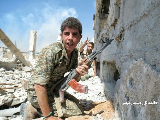 Phiến quân nã tên lửa TOW Mỹ phá hủy pháo tự hành quân Assad (video) - ảnh 12
