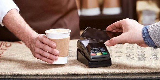 Diễn đàn năm nay sẽ thảo luận về thanh toán qua thiết bị di động. Ảnh: Forbes