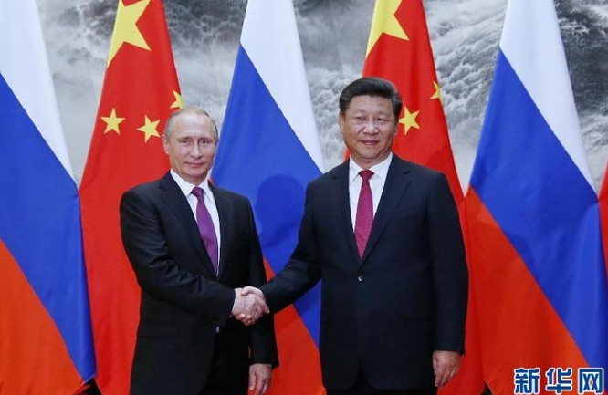 Ngày 26/6/2016, Tổng thống Nga Vladimir Putin hội đàm với Chủ tịch Trung Quốc Tập Cận Bình. Ảnh: Tân Hoa xã.