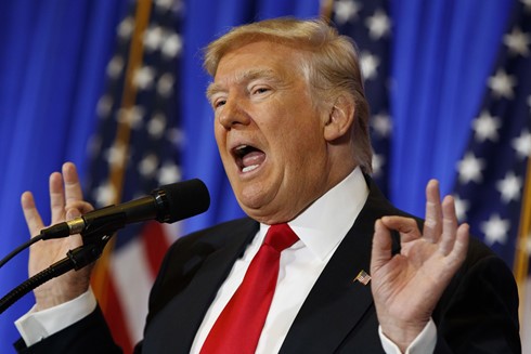 Tổng thống Trump để ngỏ những ẩn số lớn trong chính sách đối ngoại với 2 cường quốc Nga và Trung Quốc. Ảnh Reuters.