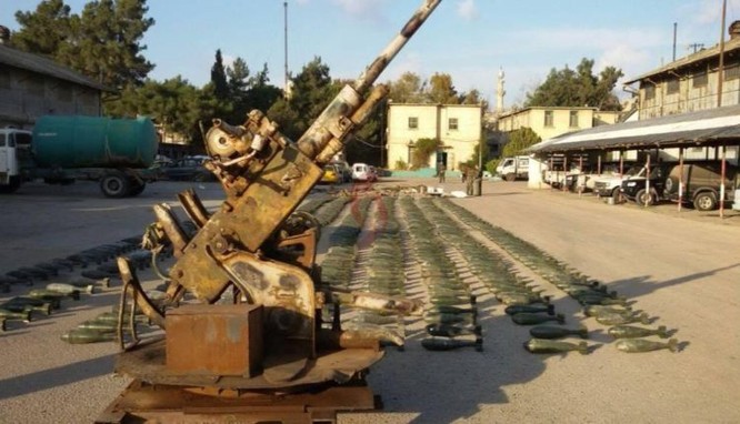IS bại trận vẫn cất giấu hàng loạt kho vũ khí khắp Syria ảnh 1