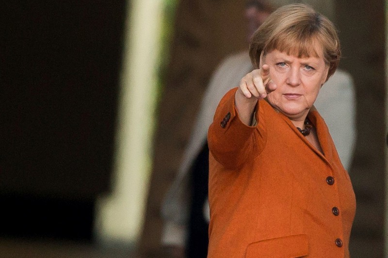 Có đối tượng bỏ đầu lợn, xúc phạm bà Merkel