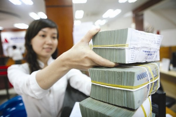 Khả năng tiếp tục phá giá tiền đồng là không thể loại trừ nên mặt bằng lãi suất khó có cơ hội được điều chỉnh giảm