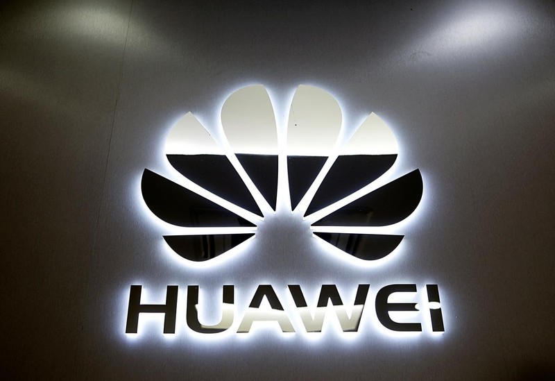 Logo của Huawei được chụp tại một cửa hàng điện thoại di động ở Singapore ngày 21.5.2019. Ảnh: Reuters Ảnh: Reuters