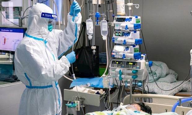 Số ca mắc Coronavirus vẫn tiếp tục gia tăng. Ảnh: The Guardian Ảnh: The Guardian