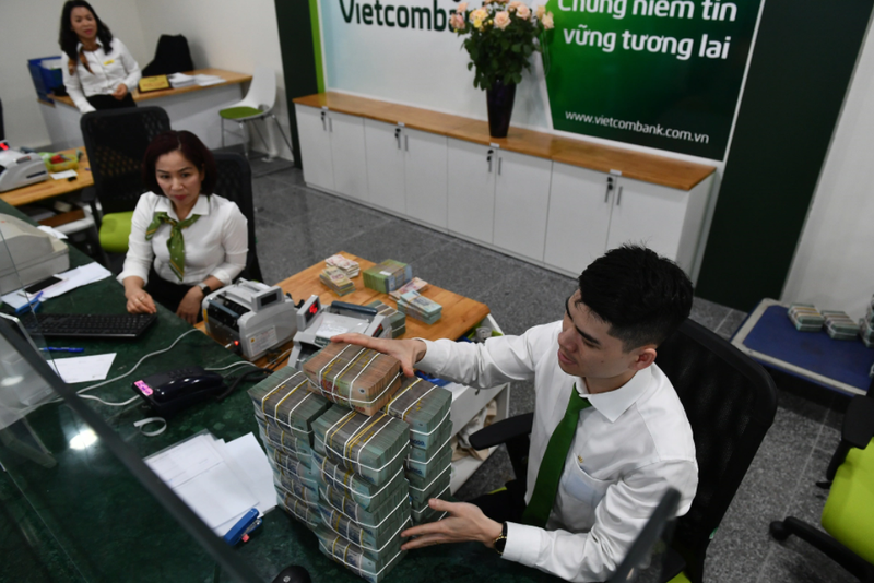 Vị thế dẫn đầu về vốn điều lệ của nhóm ngân hàng quốc doanh có thể bị phá vỡ trong năm nay. Ảnh: Hoàng Hà.