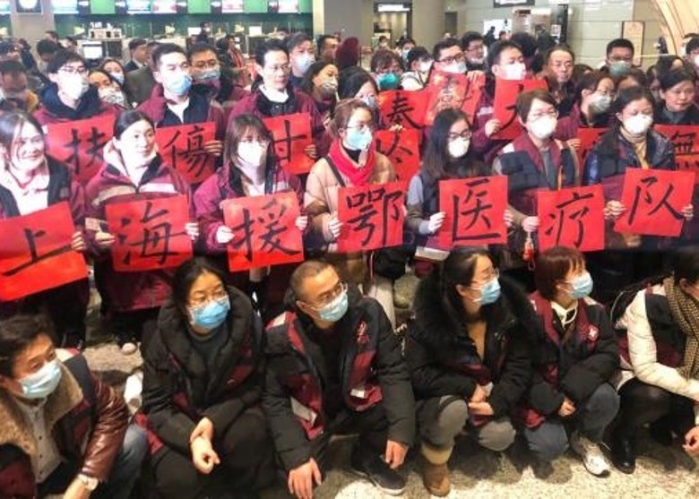 Các cán bộ y tế của Thượng Hải đến chi viện tỉnh Hồ Bắc chống dịch (Ảnh: Đông Phương).