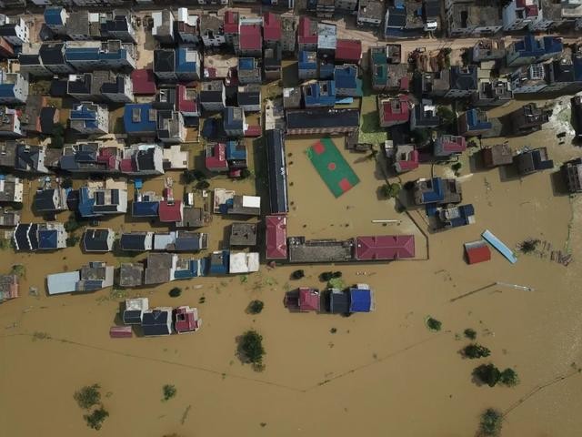 Hồ Phàn Dương ở Giang Tây bị vỡ đê, gây ngập lụt nghiêm trọng (Ảnh: Đa Chiều).