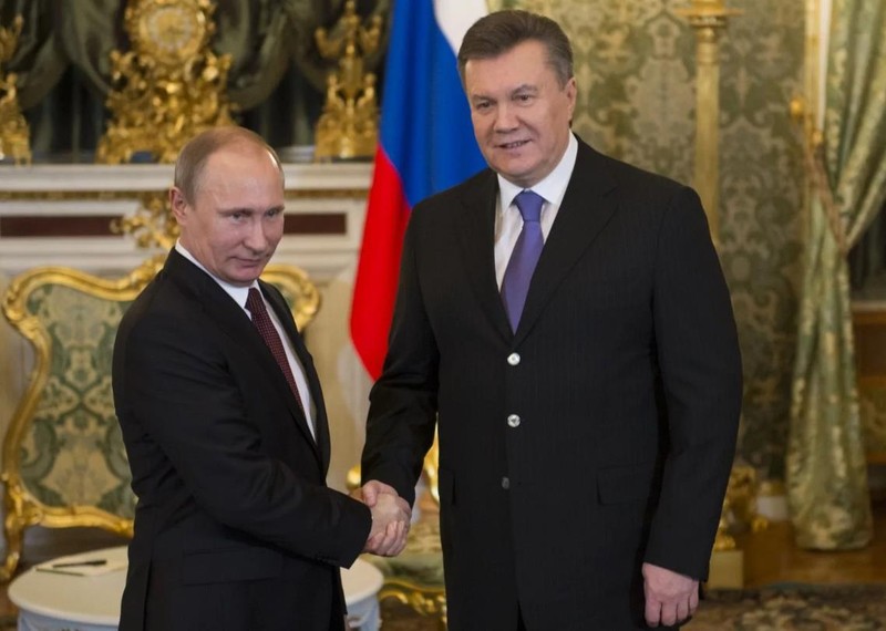 Tổng thống Nga Putin và cựu Tổng thống Ukraine Yanukovych (Ảnh: Sohu).