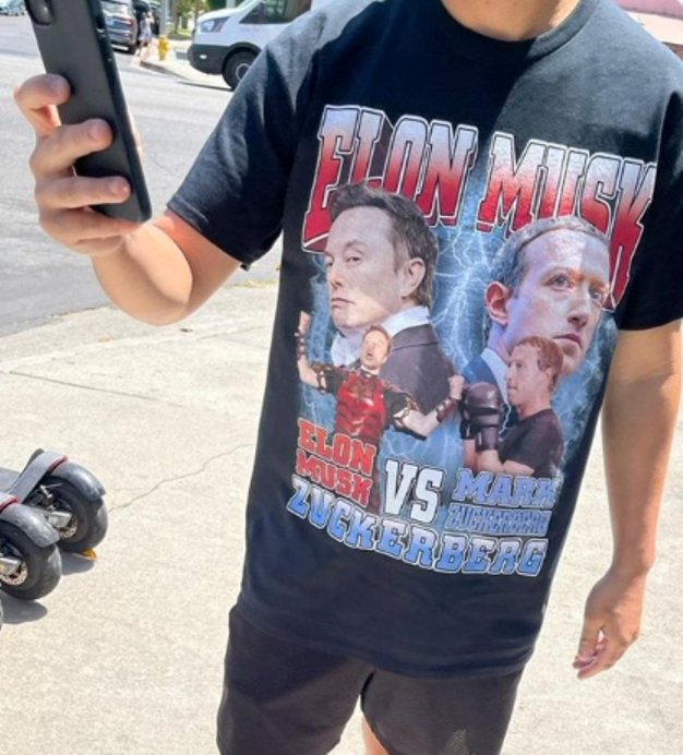 Áo pull ăn theo trận tỉ thí Elon Musk - Mark Zuckerberg đã được bán rộng rãi (Ảnh: QQ). Ao pull an theo tran dau.png
