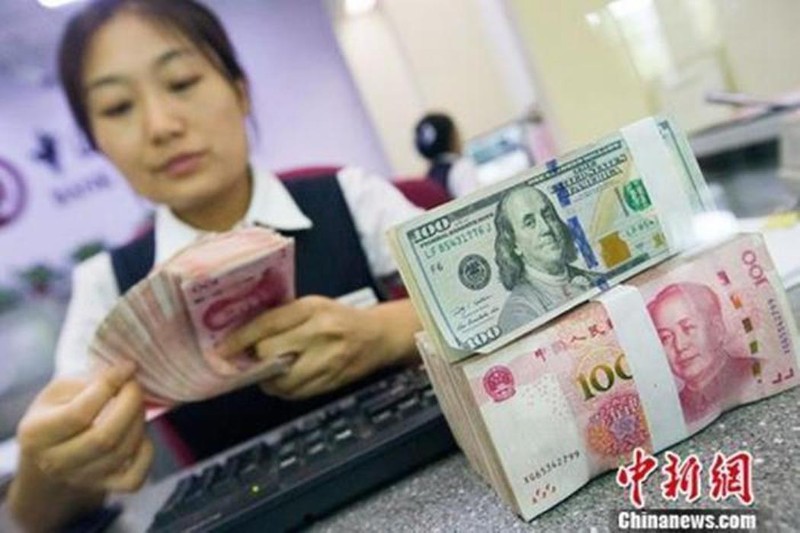 Các nhà nghiên cứu cho rằng Trung Quốc bán tháo trái phiếu Mỹ để bảo vệ đồng Nhân dân tệ (Ảnh: CNS). Ban trai phieu My de bao ve NDT.jpeg