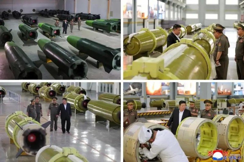 Hình ảnh Chủ tịch Kim Jong-un thị sát nhà máy sản xuất tên lửa. Ảnh: KCNA, Ong Kim tham nha may.jpg