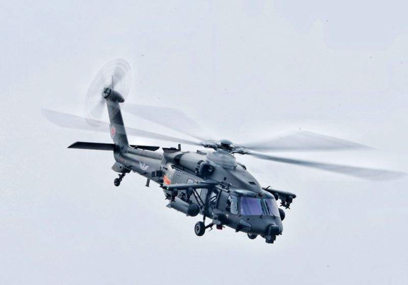 Z-20T bổ nhào tấn công. Ảnh: BJnews. Z-20T 1.png
