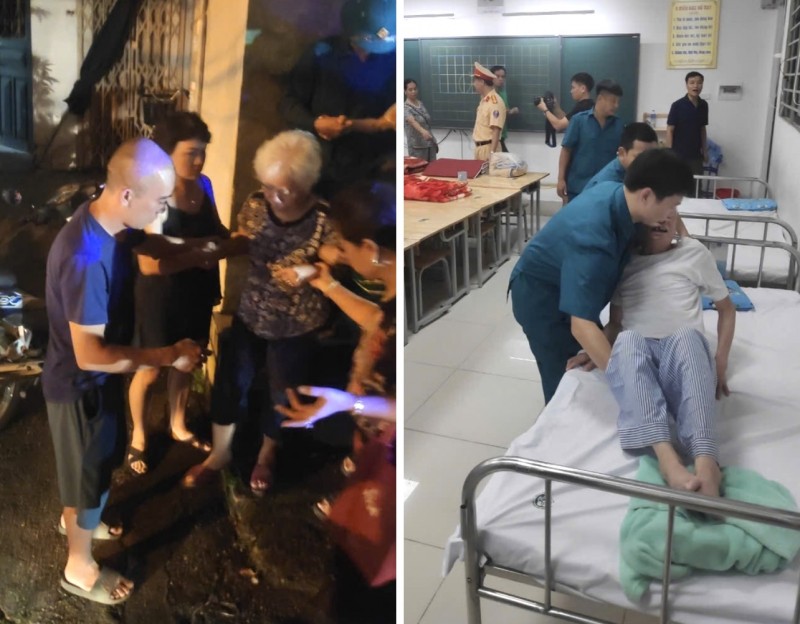 Lực lượng chức năng quận Hoàng Mai hỗ trợ người dân triển khai phương án di dời. Nguồn: CAND 3-1725713416886.jpg