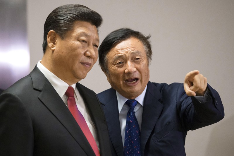 Chủ tịch Trung Quốc Tập Cận Bình và ông Nhậm Chính Phi. Ảnh: Reuters