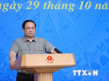 Thủ tướng Phạm Minh Chính chủ trì Hội nghị Tổng kết công tác Phòng, Chống dịch COVID-19. (Ảnh: Dương Giang/TTXVN)