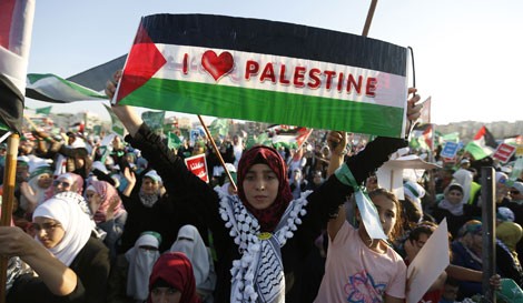 Người dân Palestine biểu tình phản đối hành động lấn chiếm đất của Israel.