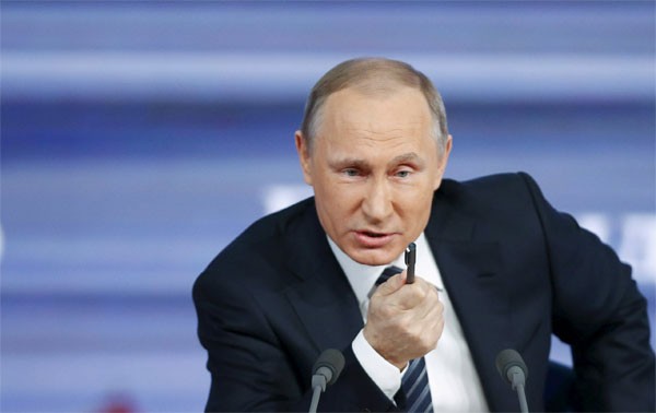Tổng thống Putin trong cuộc họp báo. Ảnh:Reuters Tổng thống Putin trong cuộc họp báo. Ảnh:Reuters