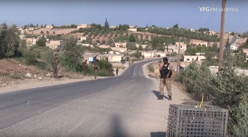 Lực lượng dân quân người Kurd truy quét phần tử đối lập và thân IS ở Kobani. Ảnh minh họa Masdar News.