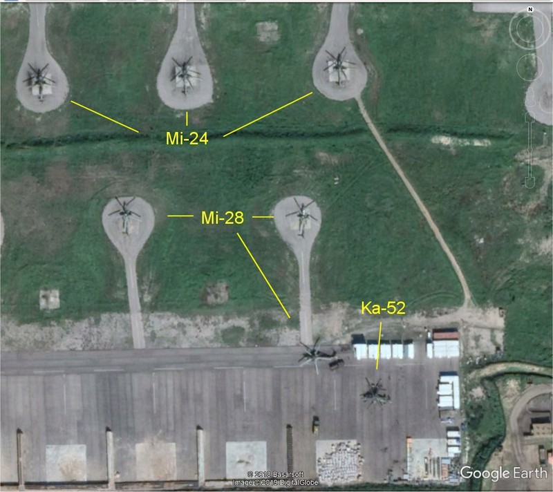 Các máy bay trực thăng chiến đấu trên sân bay quân sự Khmeimim. Ảnh: rambo54‏ @reutersanders.