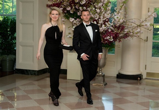 Elizabeth và Christian Holmes (Ảnh Getty Images)