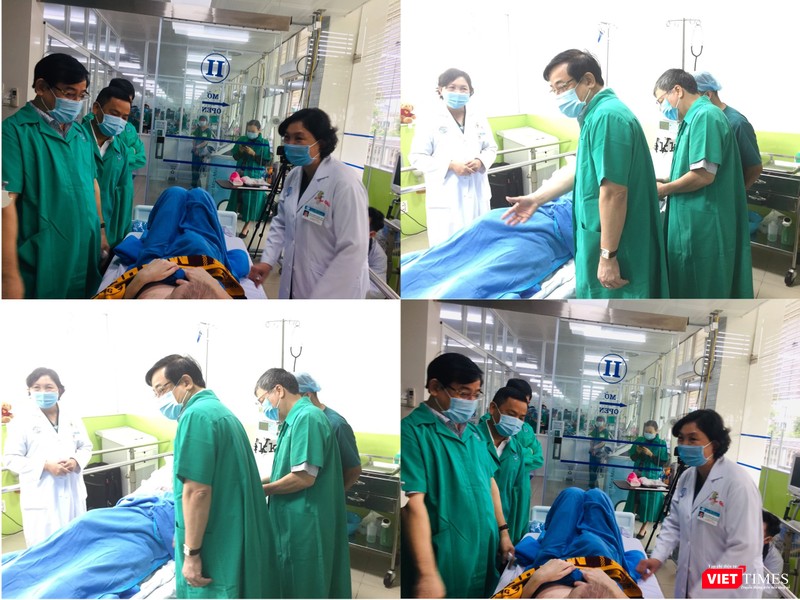 Các bác sĩ khám cho bệnh nhân 91 sáng 3/7 (Ảnh: Hòa Bình ghép) 