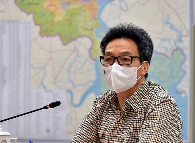 Phó thủ tướng Vũ Đức Đam tại buổi họp với lãnh đạo TP.HCM về chống Covid-19 hôm nay ngày 12/7. Ảnh: VGP/Đình Nam
