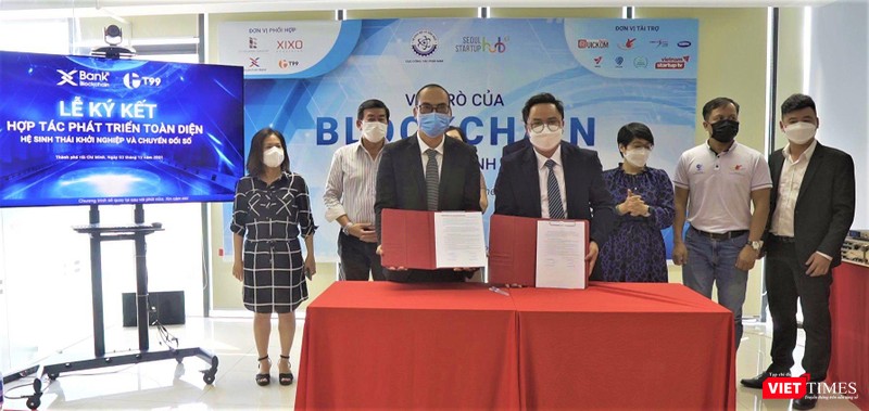 Ký kết giữa XBank và T99 đánh dấu bước phát triển trong tương lai về công nghệ và tài chính tại hội thảo - Ảnh: Hoà Bình