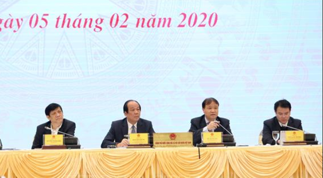 Thứ trưởng Bộ Công Thương Đỗ Thắng Hải (thứ hai phải sang) trao đổi về hoạt động xuất nhập khẩu hàng hóa nói chung và nông sản nói riêng của Việt Nam sang Trung Quốc nói riêng. Ảnh: TTXVN.