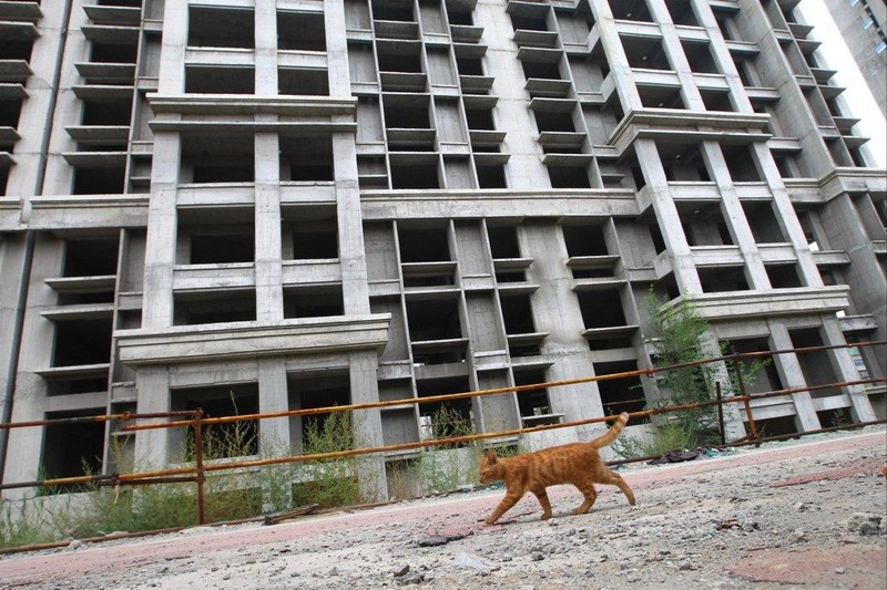 Một tòa nhà thuộc dự án Top Luxury Mansion ở Vận Thành, Sơn Tây, Trung Quốc được xây dựng dở dang do thiếu vốn (Ảnh: SCMP) Một tòa nhà thuộc dự án Top Luxury Mansion ở Vận Thành, Sơn Tây, Trung Quốc được xây dựng dở dang do thiếu vốn (Ảnh: SCMP)