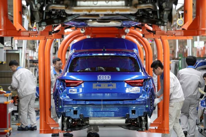 Dây chuyền lắp ráp mẫu Audi Q3 tại nhà máy FAW-Volkswagen ở Thiên Tân, Trung Quốc (Ảnh: Reuters) Dây chuyền lắp ráp mẫu Audi Q3 tại nhà máy FAW-Volkswagen ở Thiên Tân, Trung Quốc (Ảnh: Reuters)