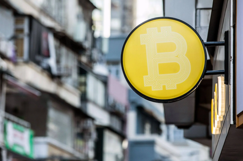 Logo của Bitcoin tại Hong Kong (Ảnh: Bloomberg) 2.png