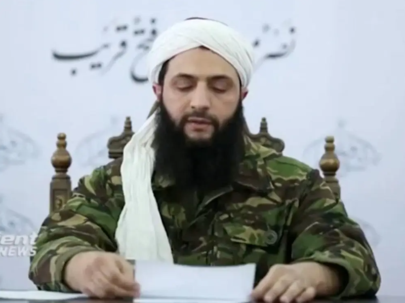 Hình ảnh thủ lĩnh HTS Abu Mohammed al-Jolani phát biểu tại một địa điểm không xác định năm 2016. Ảnh:: Reuters.