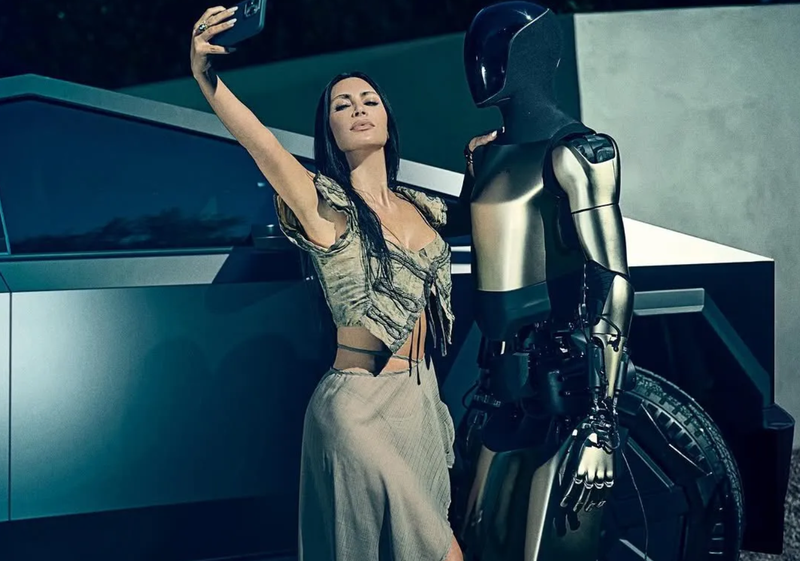 Kim Kardashian tạo dáng chụp ảnh bên chiếc Cybertruck và robot Optimus của Tesla. Ảnh: Thread.